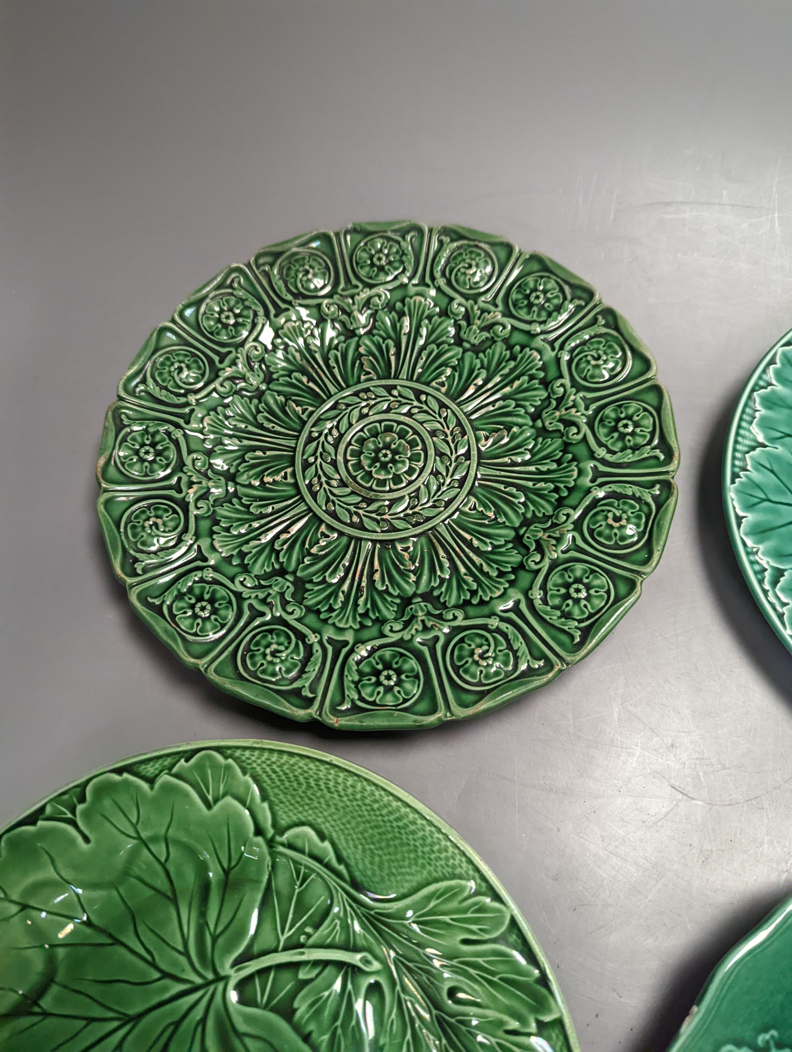 Twelve Victorian and later green glazed leaf dishes, largest 25.5cm